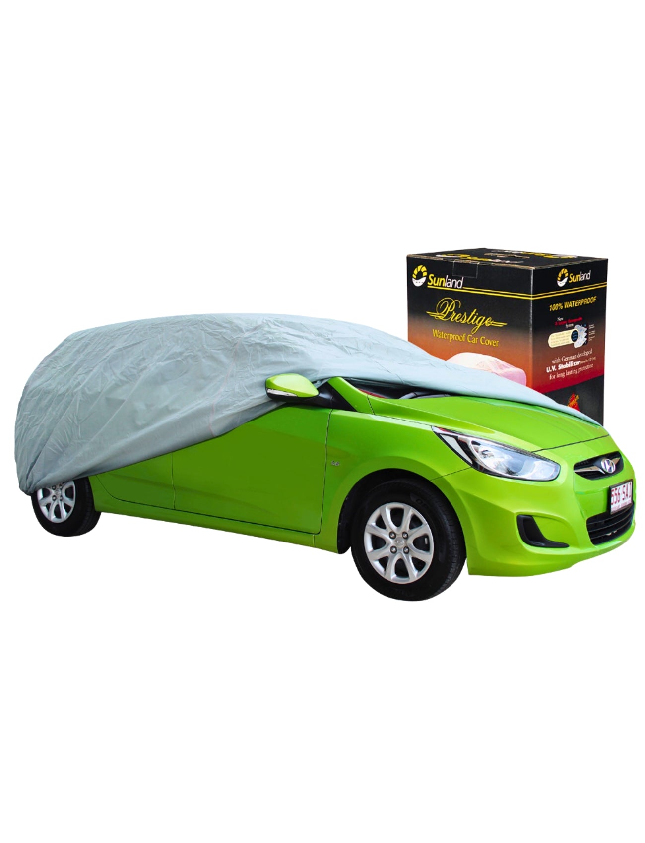 A bright green car is partially covered with Sunland-Protection's Car Cover - Hatchback Small, featuring UV-stabilized, waterproof 5-layer fabric. The silver cover represents prestige quality, with its packaging box on the right displaying branding and detailed product info.