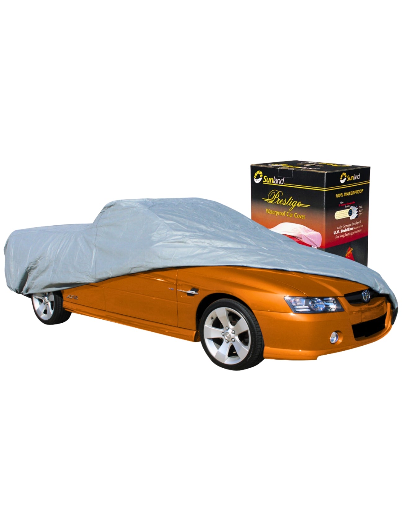 An orange car is partially covered by a sleek, silver Car Cover - Ute, offering top-tier waterproof protection and UV stabilization. Nearby, a product box from Sunland-Protection displays an image of the 4-layer fabric cover in action.