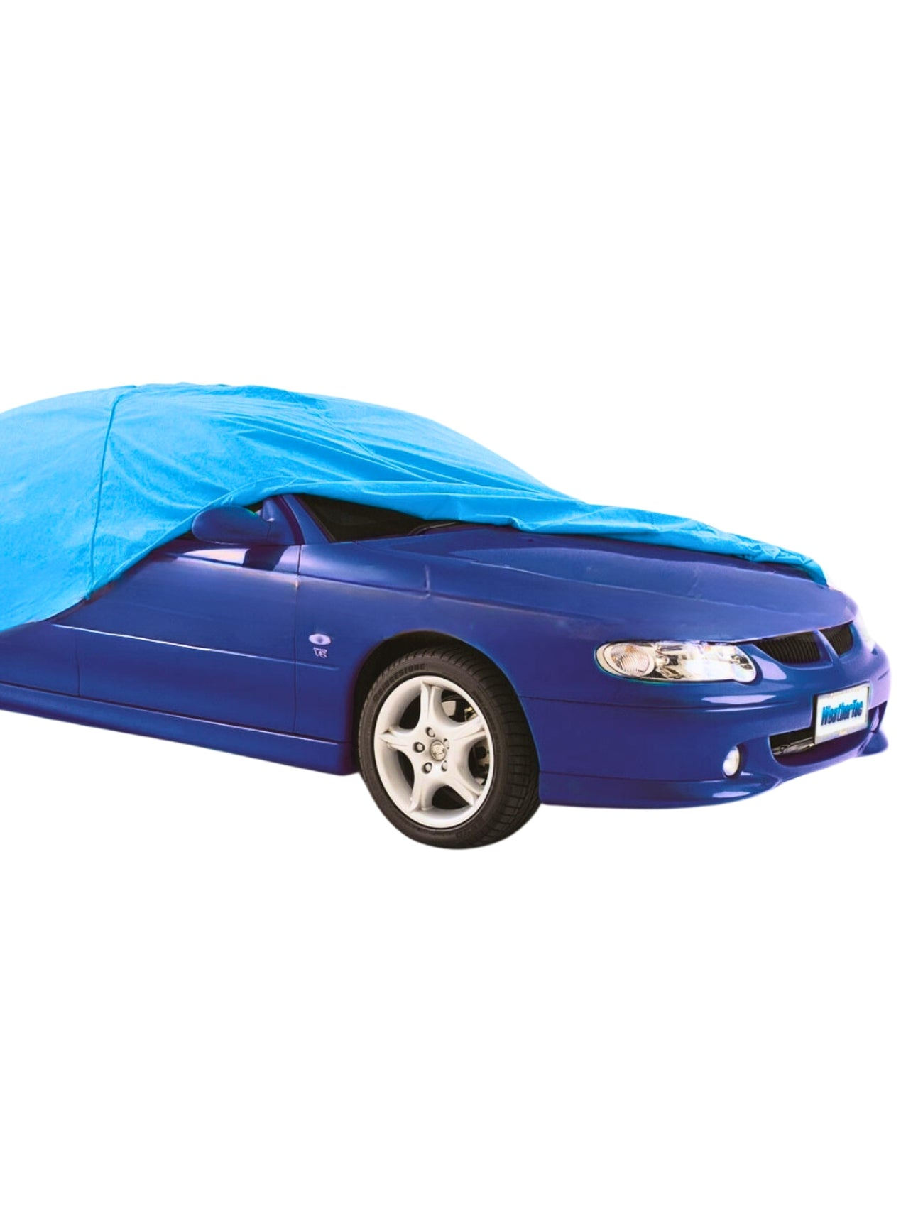 A blue car partially covered with a Sunland-Protection WeatherTec Car Cover - MEDIUM. The headlights and grille are visible, while the UV-stabilized, breathable fabric drapes over the rear section, extending toward the ground.