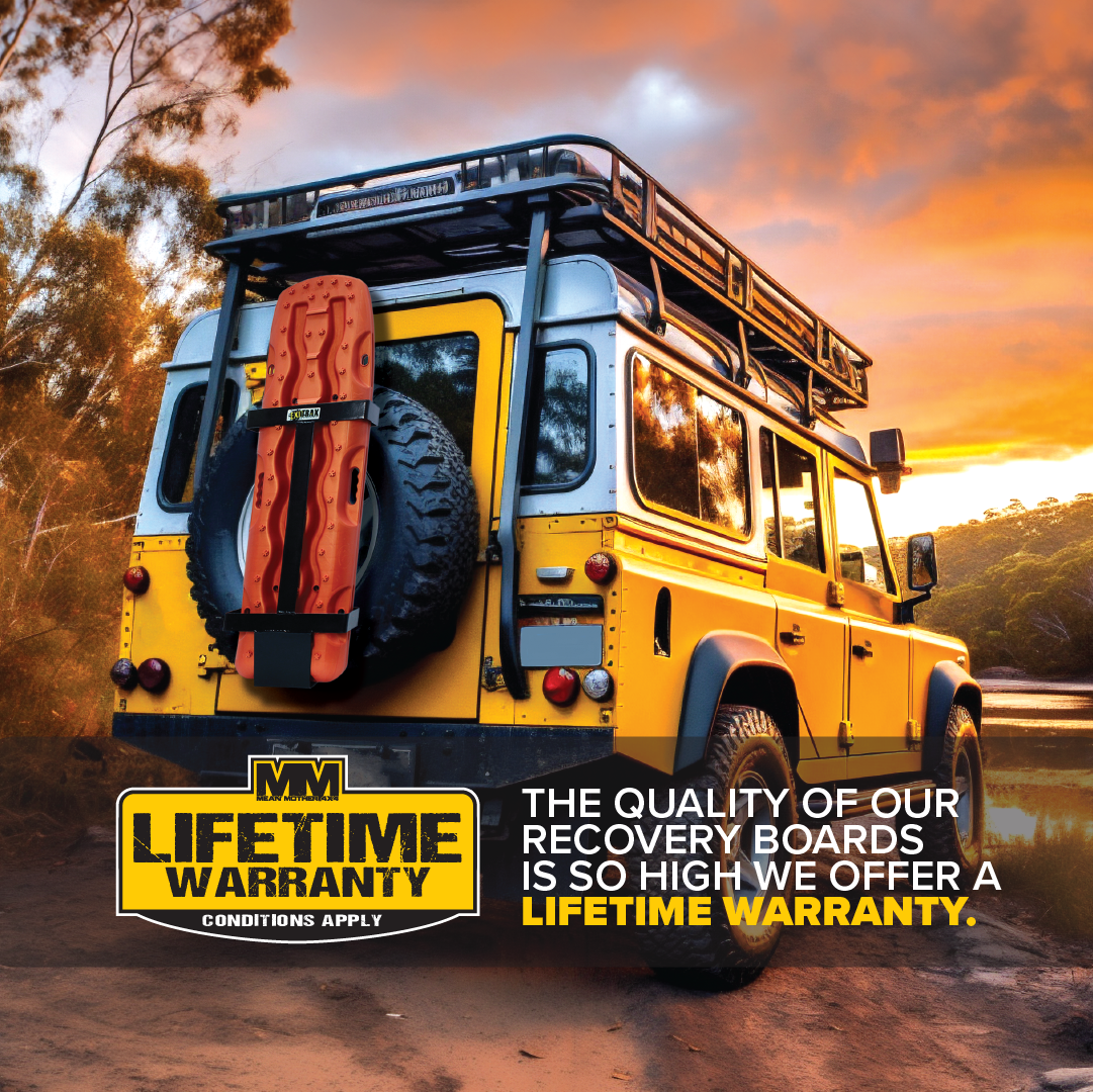 A yellow off-road vehicle by a lake at sunset with Exitrax Recovery Boards 1110 Series - Metallic Sunrise Red + Mounts Bundle on the back. Text: “Our recovery boards are so reliable, we back them with a Lifetime Warranty.”.