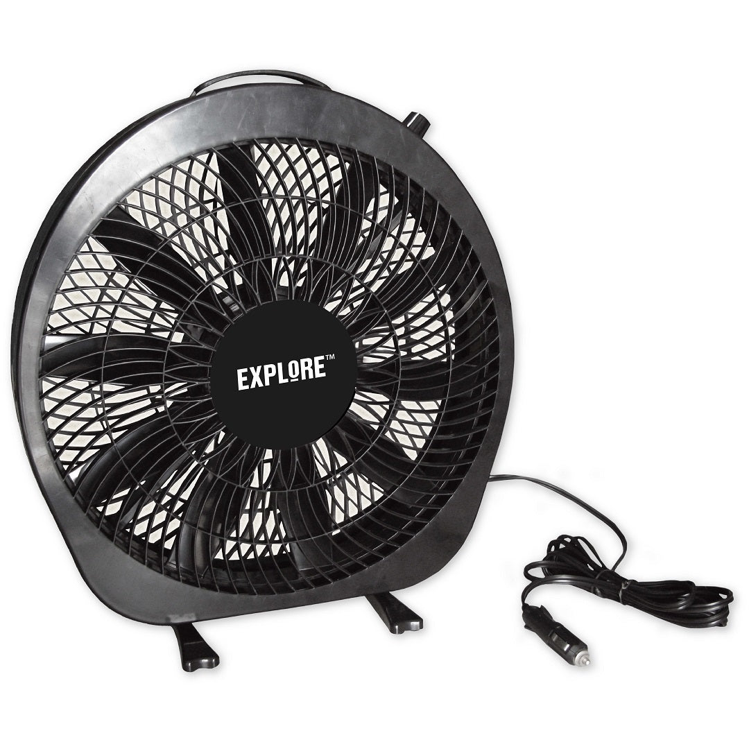 The 12V Caravan Fan by Explore is a black, circular fan with a protective grill and black blades. It features a power cord with a car adapter plug, perfect for recreational use in vehicles or outdoor activities.