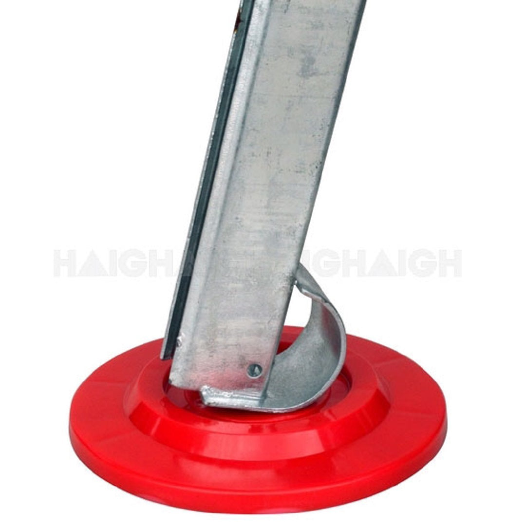 Close-up of an Explore Anti-Sink Plate from a 4-pack, featuring a red, round base for caravan stabilizers. The angled structure ensures stability even on soft ground. The plain white background highlights the sturdy design of this product by Explore, proudly Australian-made.