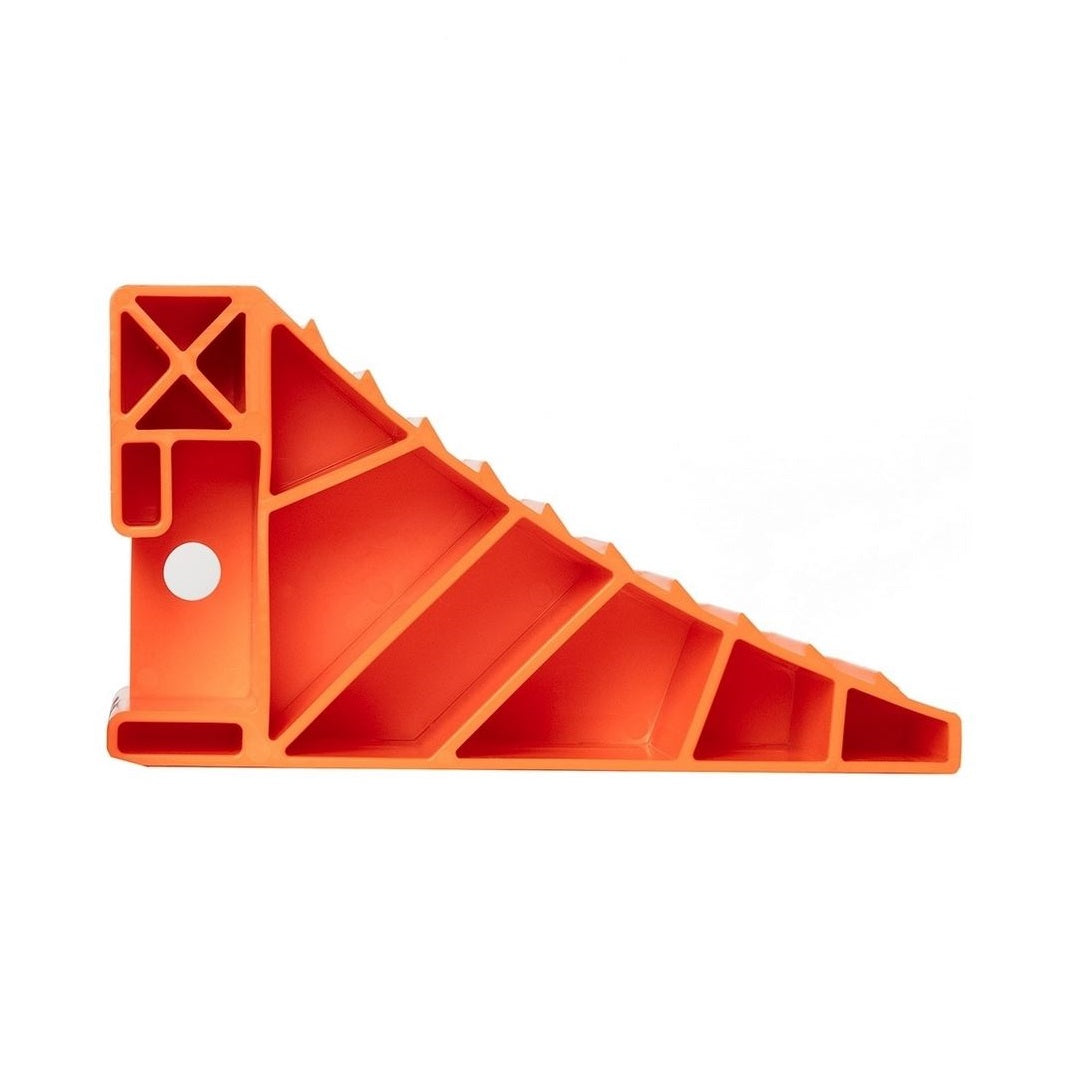 The Explore Wheel Chocks are orange, triangular-shaped tools made from durable plastic. They feature hollow sections and ridged edges to enhance stability or leveling. This Australian-made product is designed for high visibility and is shown against a white background.