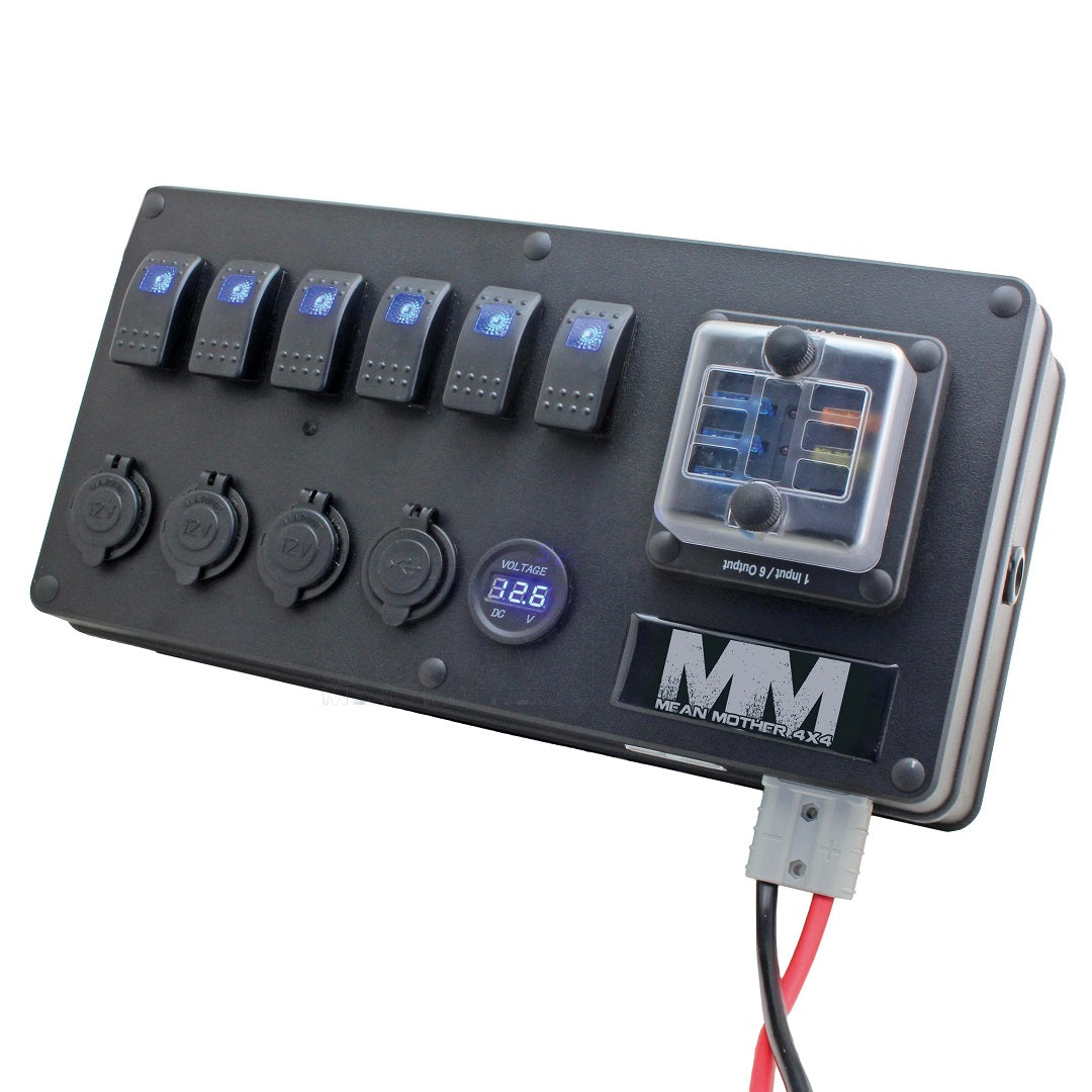 The Mean Mother 12V Power Control Box is a black unit featuring six toggle switches, four circular 12V DC power outlets, a digital voltage display reading "8.26 V," and a waterproof fuse box. The panel, ideal for canopies and caravans, showcases the "MM" logo with the text "Mean Mother 4X4" at the bottom right.