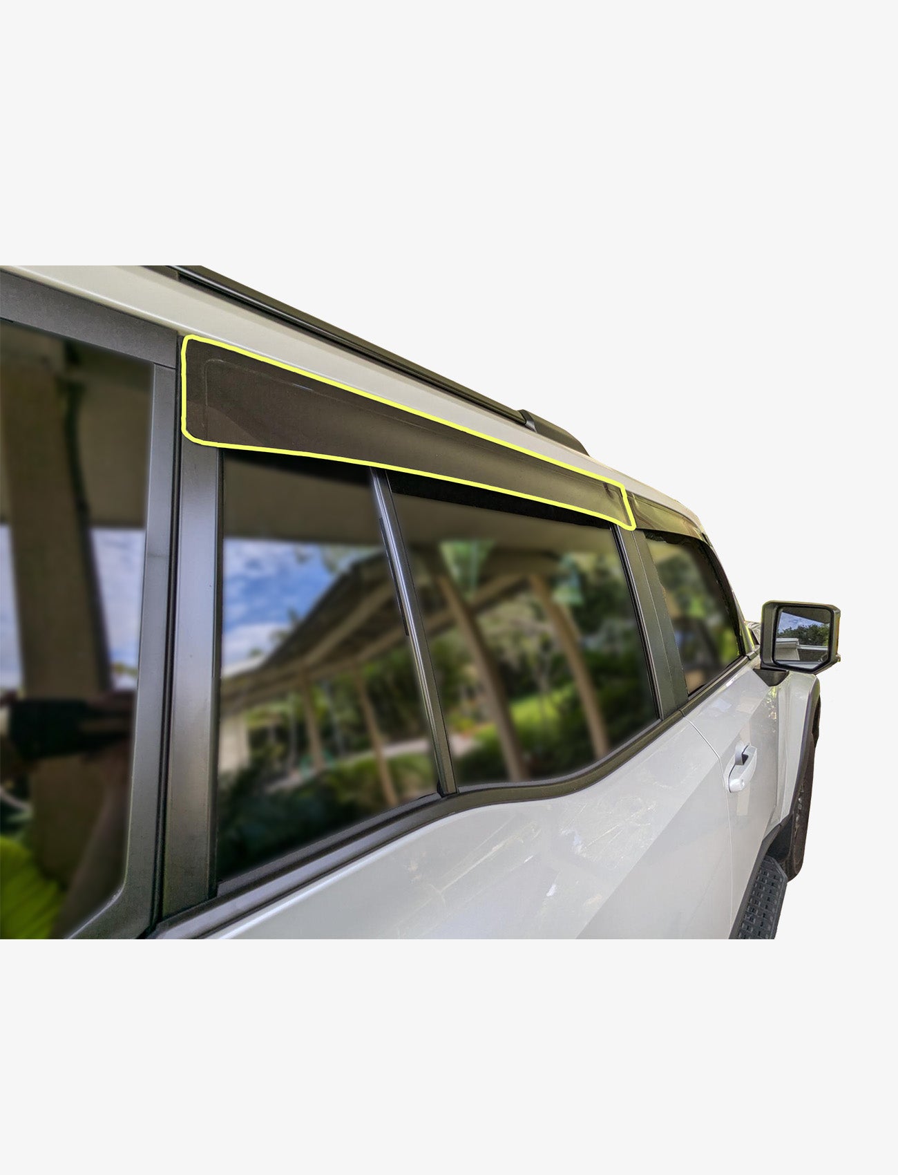 A close-up side view shows a white SUV fitted with a Sunland Protective Plastics Toyota Prado 250 Series Slimline Weathershield, Rear Driver, Dark Tint, crafted from UV stable acrylic and running parallel to the top window edge.