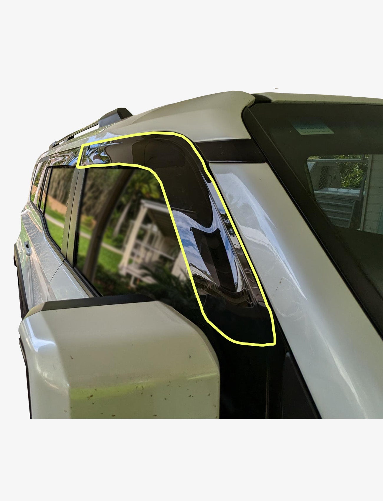 A close-up of a Toyota Prado 250 Series with a Sunland Protective Plastics Slimline Driver Weathershield in dark tint on the front passenger-side window. The side mirror and building are visible in the reflection.