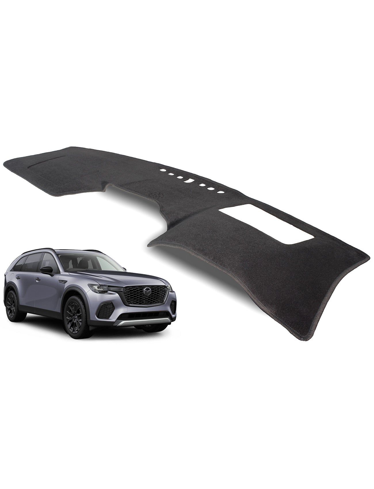A gray SUV is parked in front of the Mazda CX-70 KJ Dash Mat by Sunland-Protection, a large, black dash mat designed for vehicle interiors. It features vent and control cutouts to protect the dash and keep the vehicle cool.