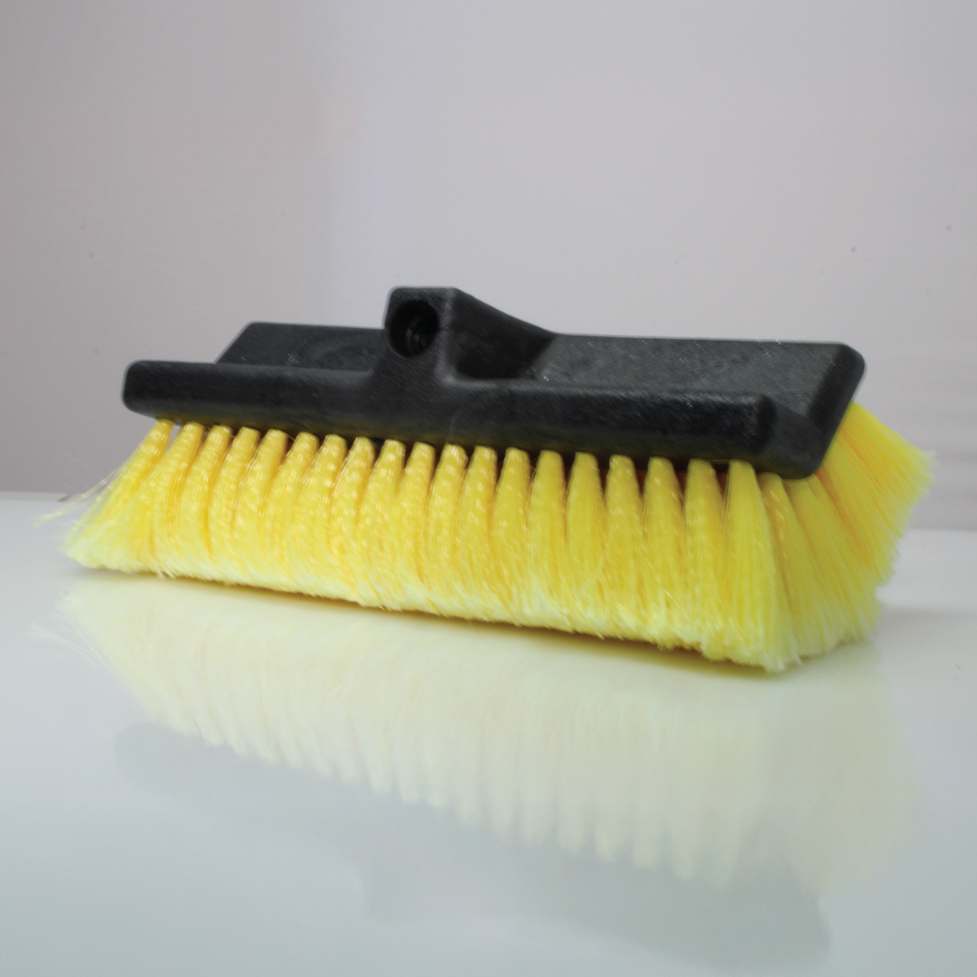 The Car Wash Brush Replacement Head by Bubbles, with vibrant yellow bristles, is displayed on a glossy white surface against a plain background.