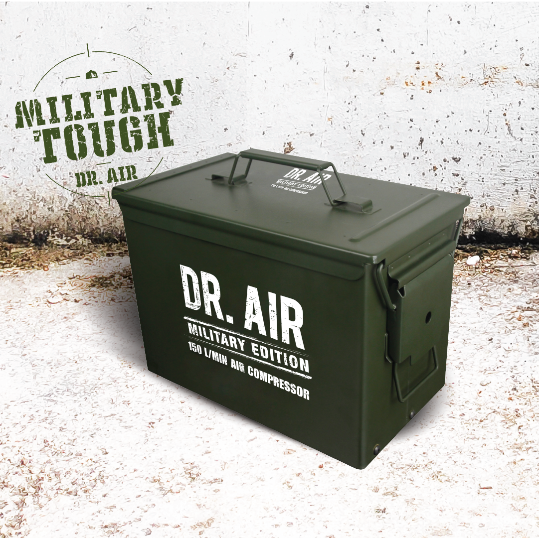 A green metal box against a white wall is labeled "Dr Air Ammo Box Air Compressor" and "4WD Air Compressor 150 Lpm," featuring a Military Tough design. This heavy-duty ammo-housing style includes a top handle and front latch, ensuring rugged reliability.