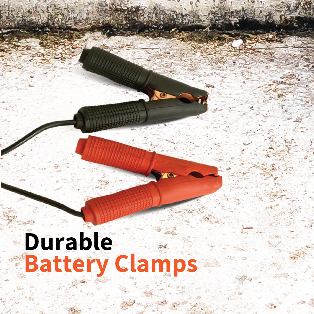 Close-up of two battery clamps on a textured surface. One clamp is black, and the other is red. Text on the image reads "Durable Battery Clamps." Built with military-tough standards, these Dr Air ammo box air compressor clamps ensure reliable connections for your 4WD air compressor in any terrain.