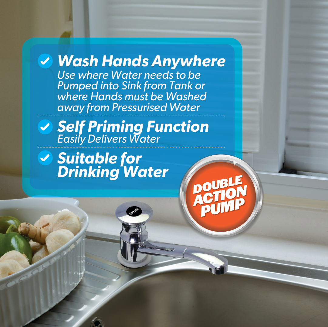 The Explore RV Sink Hand Pump - Chrome is featured beside a fresh produce basket on a kitchen counter. Ideal for camper trailers and outdoor wash stations, the packaging emphasizes features such as "Wash Hands Anywhere," "Self Priming Function," and "Suitable for Drinking Water." A label prominently reads "DOUBLE ACTION PUMP.