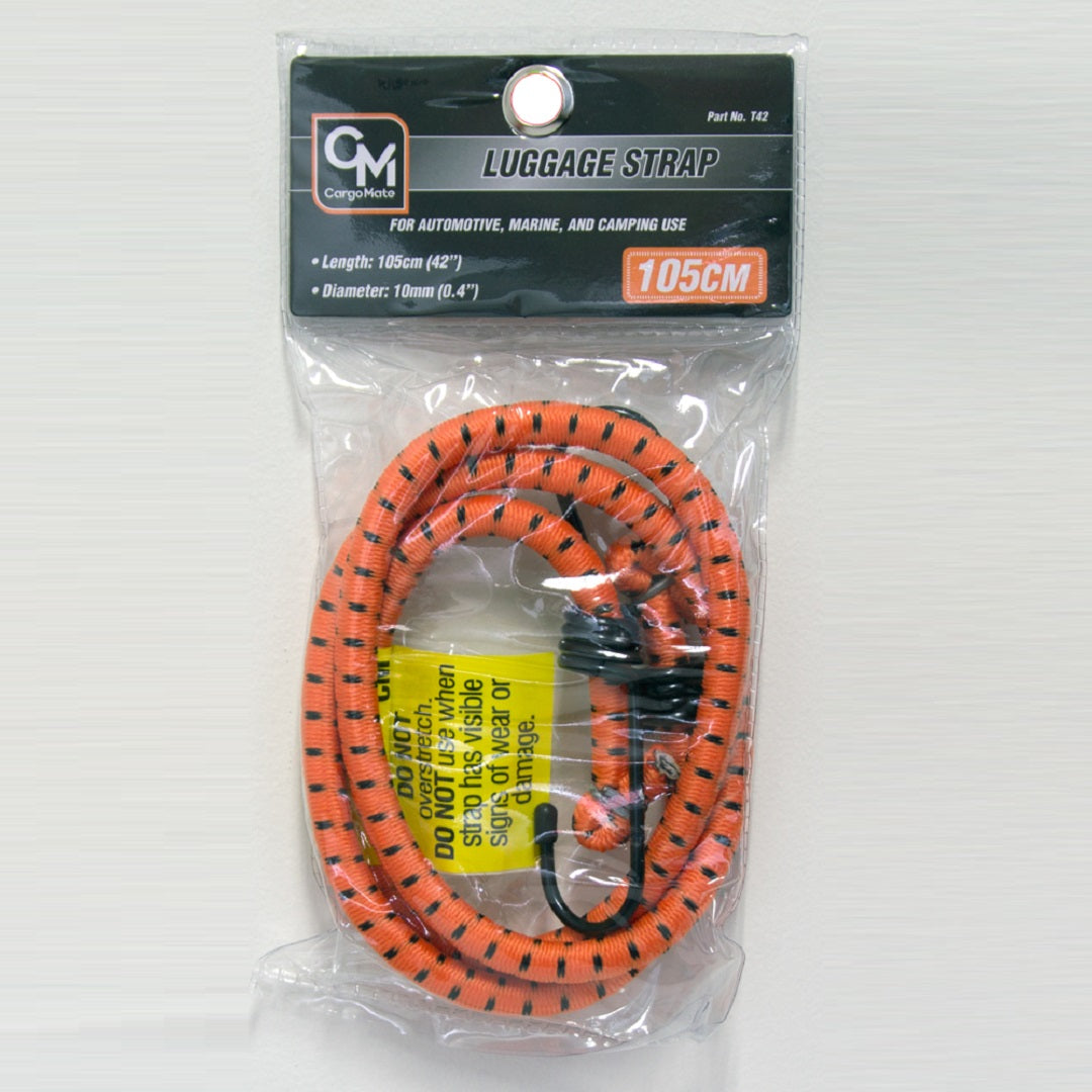 A coiled, orange-patterned elastic strap with black dots is packaged in a clear plastic bag. The packaging is labeled "Cargo Mate Occy Strap - 105cm" with dimensions of 105 cm length and 10 mm diameter. A warning tag is attached inside the packaging.