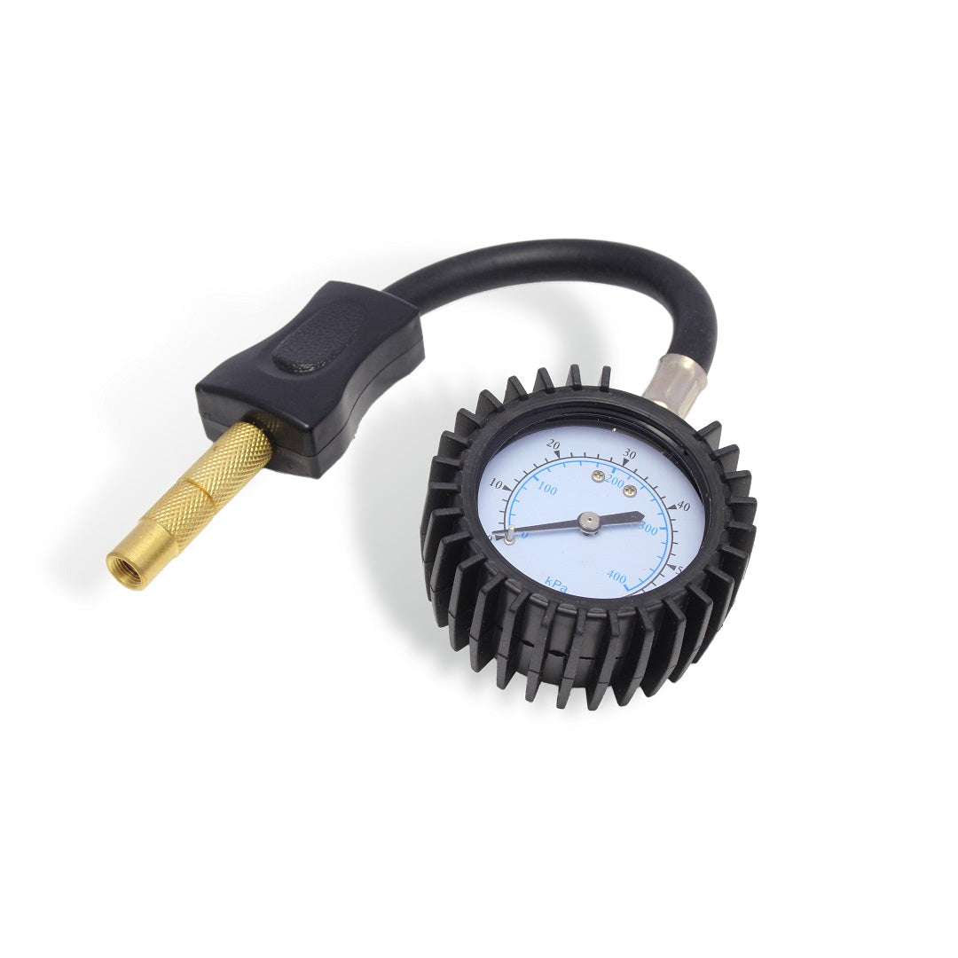 The Dr Air Tyre Pressure Gauge 60psi, from renowned brand Dr Air, features a black rubber hose, a brass nozzle, and a circular dial encased in a protective black rubber cover. Specifically designed for 4WDs, the gauge sports a white background with black and blue markings to clearly indicate pressure levels. Perfect for preventing tyre deflation.