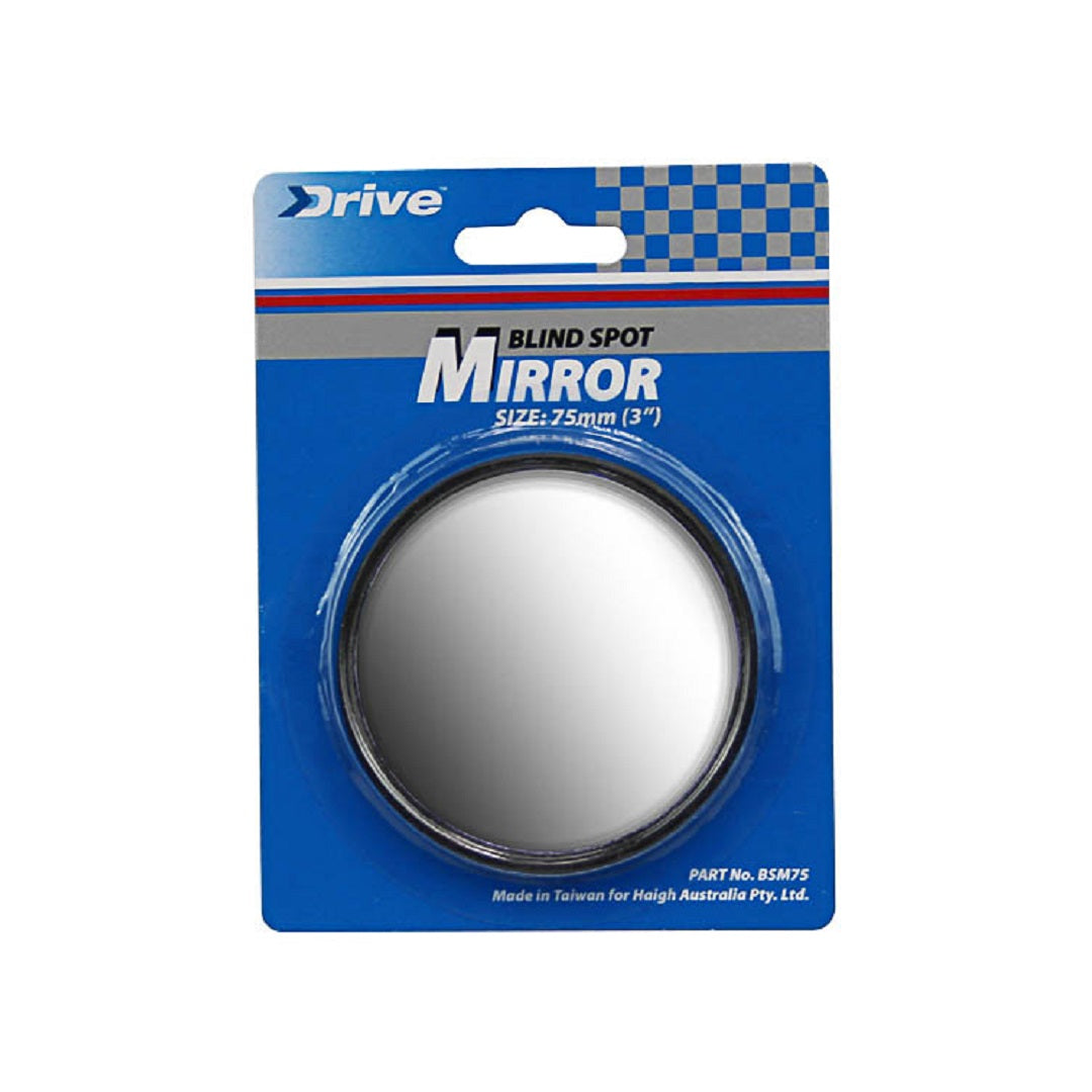 A packaged Drive blind spot mirror with a blue background. The label says "Drive Blind Spot Mirror SIZE: 75mm (3")," featuring stick-on mounting for easy installation. It’s made in Taiwan for Haigh Australia Pty. Ltd., part number BSM275, ensuring safer driving by enhancing your field of view.