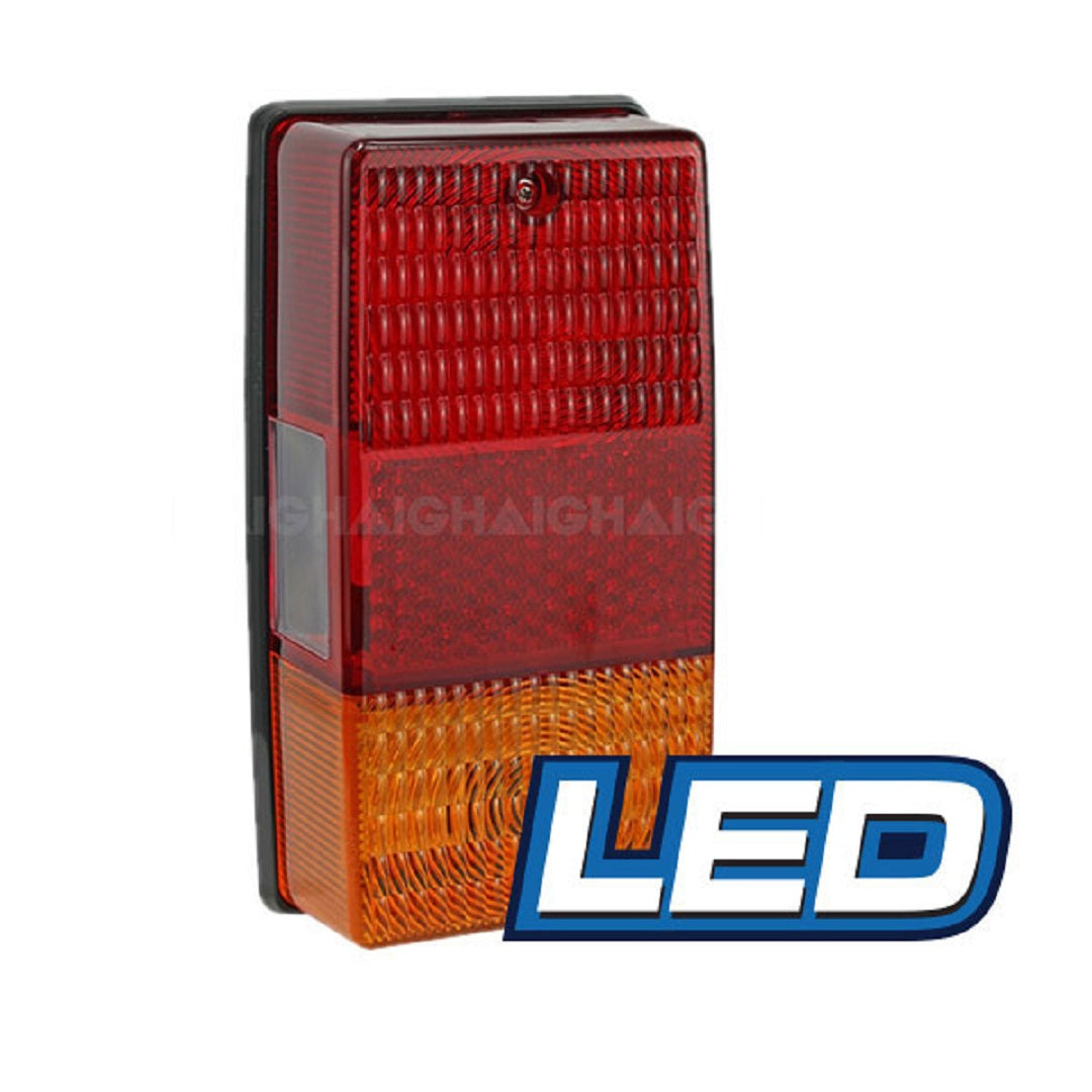 Close-up of the Eagle Eye LED Trailer Lamp - Combination, a rectangular light featuring red and amber sections divided into three segments. The lamp has a textured surface for improved visibility. "LED" is prominently displayed in large blue and white text on the right.