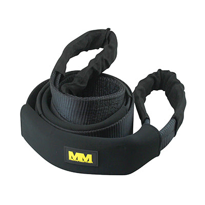 A coiled, black Mean Mother Equaliser Strap 75mm / 2.5m 12,000kg with padded covers on each end is shown. The strap, featuring a yellow and black "AM" logo, is ideal for recovery operations. The padded areas ensure surface protection and added durability while the design facilitates proper load distribution.