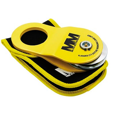 The Mean Mother Snatch Block 8,000kg, featuring the "MM" logo and designed for an 8,000 kg capacity, is perfect for use with winch cables. It comes with a coordinating padded case in black and yellow—an essential addition to your collection of recovery accessories.