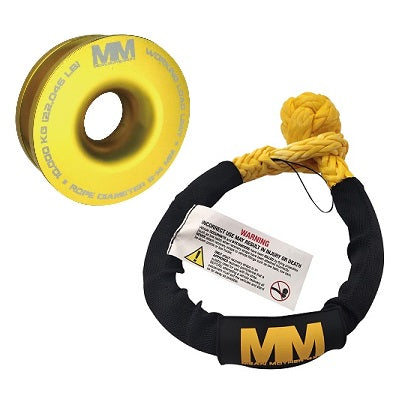 The "Soft Shackle & Snatch Ring Bundle" from Mean Mother 4x4 includes a yellow snatch ring and a yellow UHMPE soft shackle with black covering, both adorned with the "MM" logo. The snatch ring is marked with weight and diameter information, while the shackle comes with a warning tag, making it an essential addition to any 4x4 Recovery Kit.