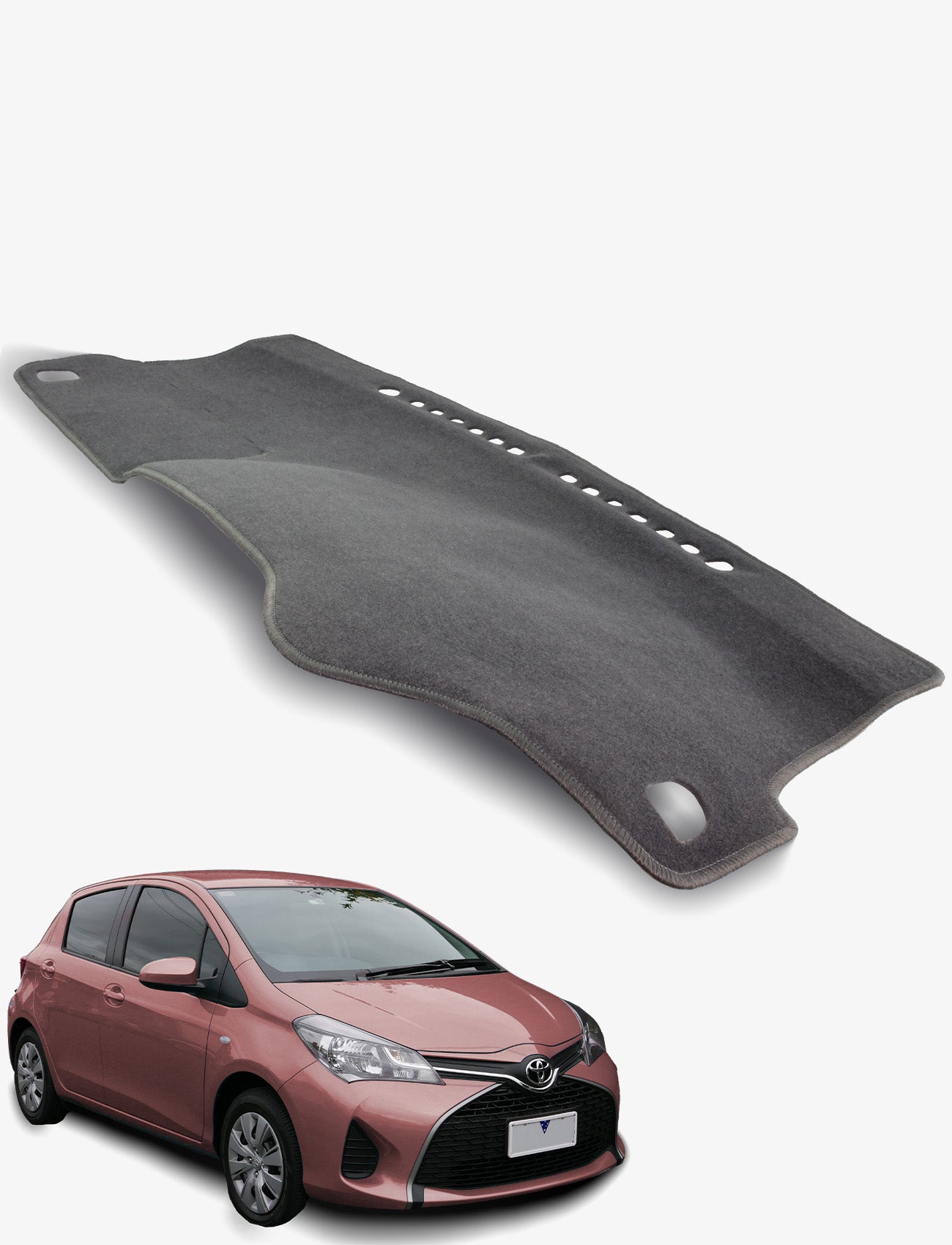 A Sunland-Protection Toyota Yaris Dash Mat in dark gray is shown above a pink Toyota Yaris hatchback on a white background. It keeps your car cool and preserves resale value with stylish protection.
