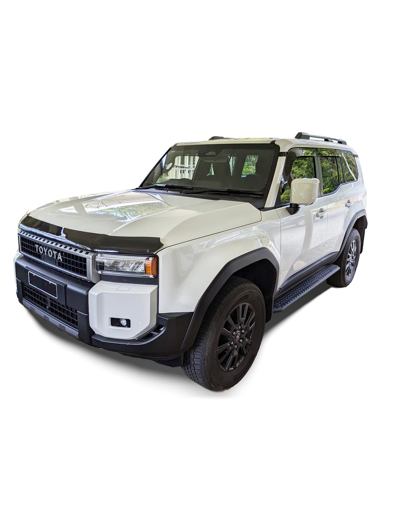 A white Toyota SUV with black accents, tinted windows, and black wheels is showcased on a white background, fitted with Sunland Protective Plastics Toyota Prado 250 Series Headlight Protectors (2 Piece) for added style and protection.