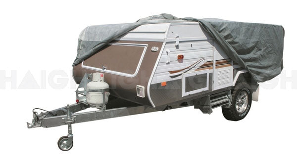 A pop-up camper trailer with a Prestige Caravan Cover 2.4m - 3.1m partially extended, crafted from UV-stabilised, triple-layer, waterproof fabric by Prestige, showcases a propane tank attached to the front hitch and features a brown and white exterior design. The trailer's wheels are visible, set against a white background.