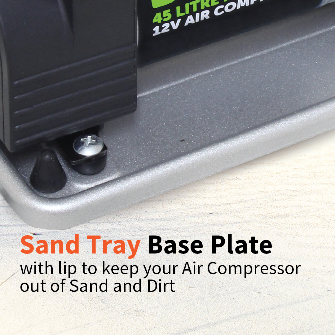 Close-up image of a sand tray base plate with a lip, specifically designed for the Dr Air 12V Air Compressor 45 Lpm. The text emphasizes its function: to protect the compressor from sand and dirt. A screw is visible on the tray.