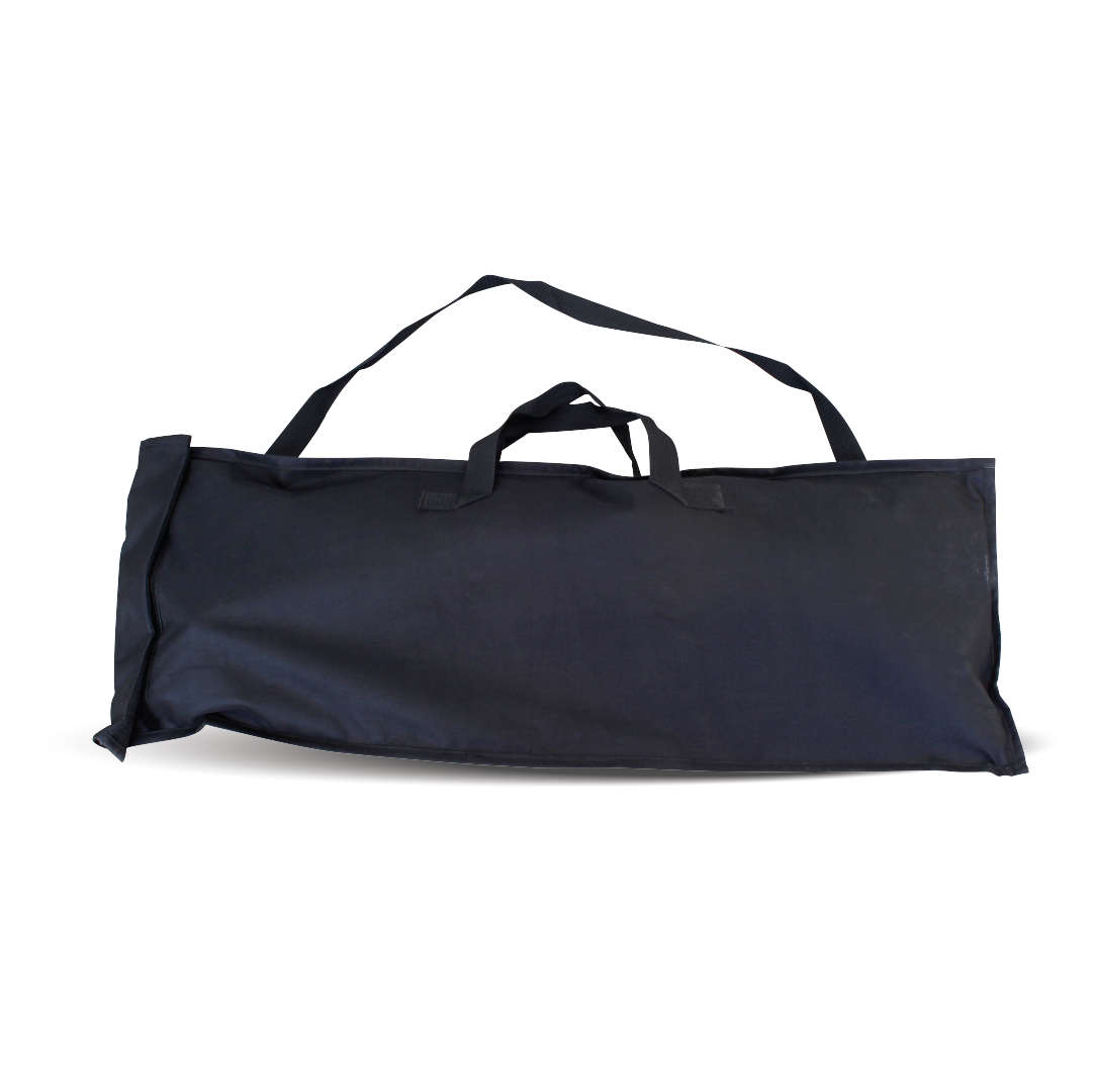 A large black duffel bag equipped with two short handles and an attached long shoulder strap, lying flat on a white background, is perfect for storing your Mean Mother 5-IN-1 Multi 4x4 Recovery Shovel.