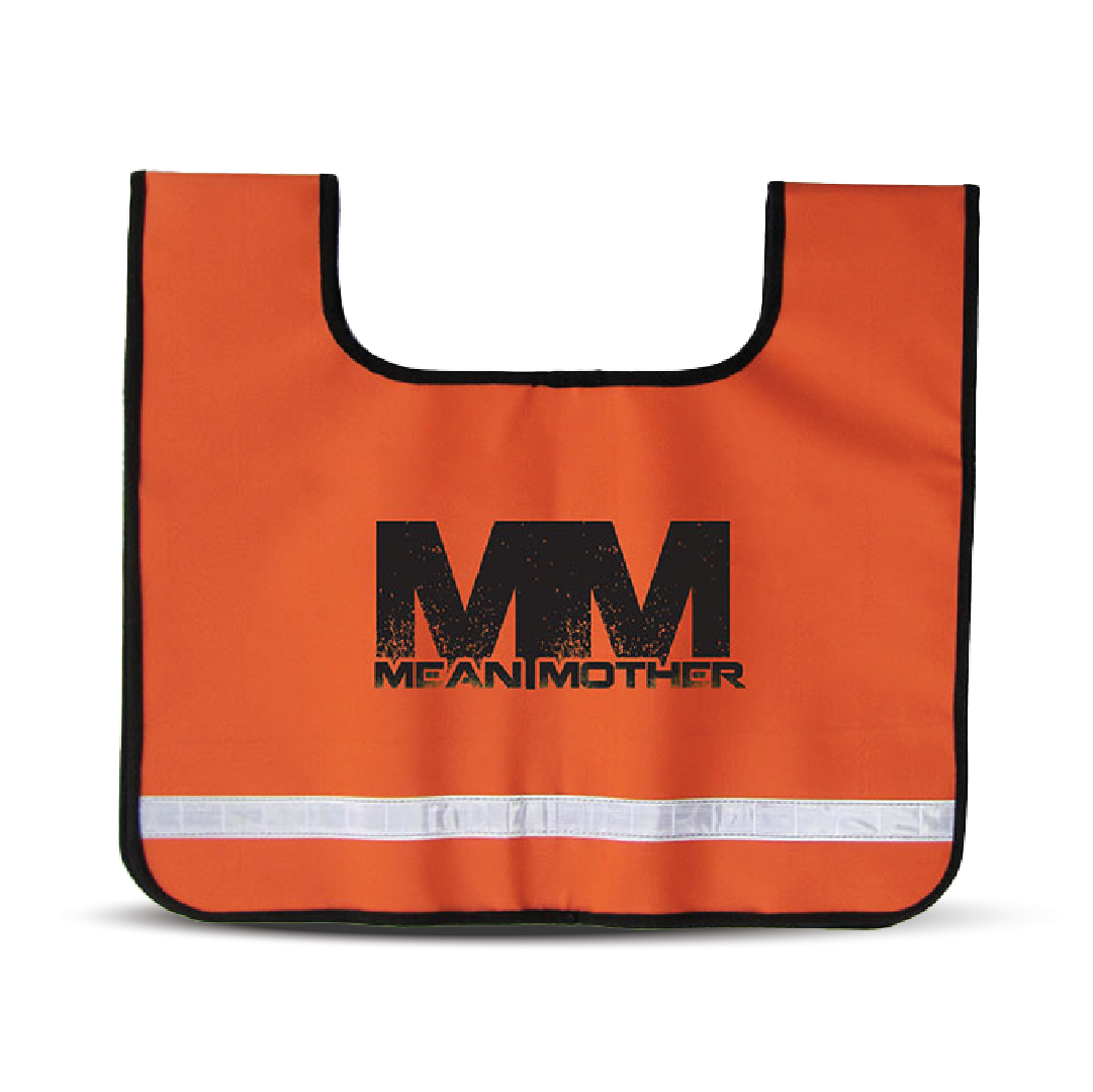 The Mean Mother Recovery Dampener Blanket, an essential safety accessory, is designed in orange with black trim and features a reflective white stripe at the bottom to enhance visibility. The front showcases a black "MM" logo with the words "Mean Mother" beneath it, making it as critical as your winch cable damper in hazardous conditions.