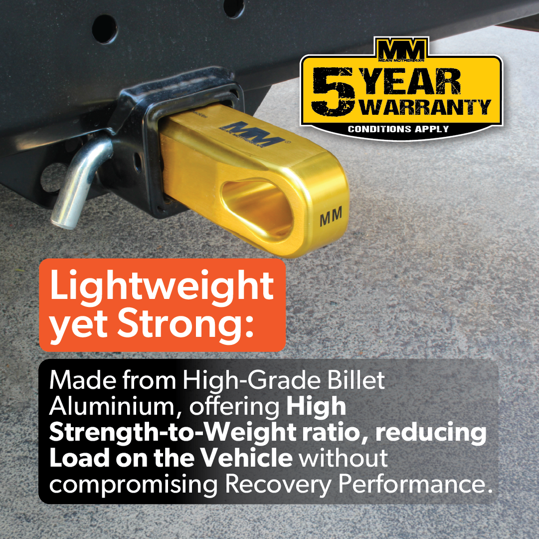 A gold Mean Mother 4x4 Recovery Hitch is mounted to a vehicle, displaying a "5 Year Warranty" badge. Made from lightweight, strong billet aluminium, it boosts vehicle recovery performance and reliability.