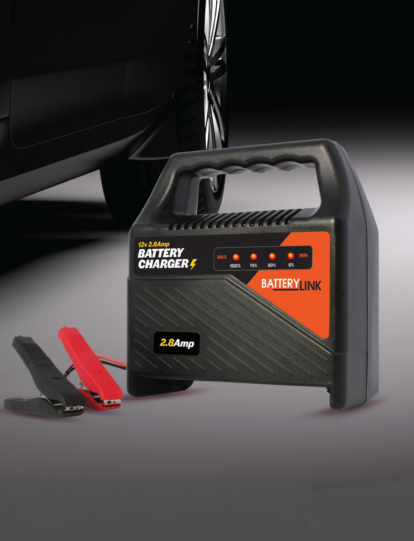 A 12V 2.8 Amp battery charger, branded as "Sunland-Protection" and labeled "Battery Charger," is placed near a car tire. The charger, equipped with Overload Protection and a black handle, features a control panel with LED indicators displaying charging levels. Red and black battery clips are placed beside it, and it includes a 2-Year Warranty.